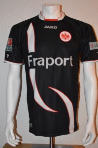 2009_-_2010_Matchworn_Martin_Fenin_away_vorn_mit_T-Home_und_neuem_BuLi_Patch